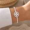 Pulsera con dije giratorio 1058