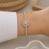 Pulsera ad con dije giratorio 1061