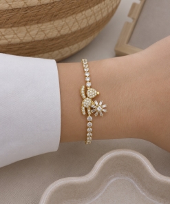 Pulsera ad con dije giratorio 1066